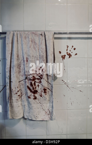 a bloody towel on a towel rail Stock Photo