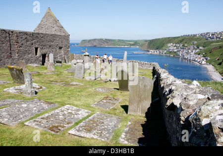 View of Gardenstown and the ruined church of St Johns, in the North East of Scotland Stock Photo