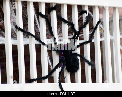 Halloween decorations in the front yard of a house on Halloween. Stock Photo