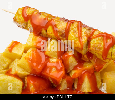 Chicken kebabs and fried potatoes with spicy sauce Stock Photo