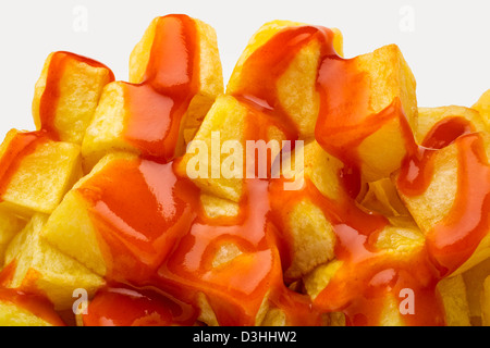 Fried potatoes with spicy sauce Stock Photo