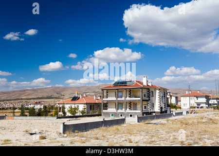 Houses with solar panels Stock Photo