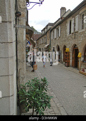 ROCAMADOR, FRANCE - SEP 17 - Tourists walk on the medieval streets on Sep 17, 2011 in Rocamadour, France  Stock Photo