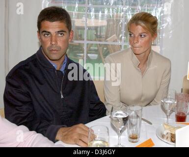 (dpa) - Athina Onassis (R), granddaughter of late Greek billionaire Aristoteles Onassis, and her boyfriend Alvaro Miranda de Neto attend the 'AUDI Opening Night' on the eve of the 75th show jumping and dressage derby in Hamburg, Germany, 19 May 2004. The derby takes place from 20 to 23 May. Stock Photo