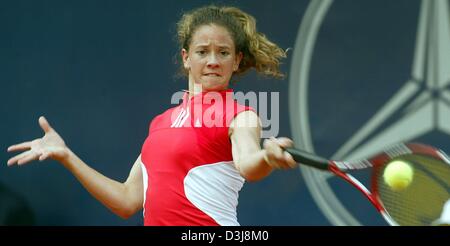 (dpa) - Swiss tennis player Patty Schnyder hits a return in a match against Daniela Hantuchova from Slovakia at the Centre Court in Berlin, Germany, 4 May 2004. Schnyder won the German Open match in straight sets 6-2, 6-2. Stock Photo