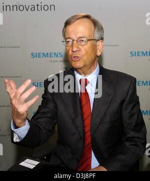 (dpa) - Heinrich von Pierer, Chairman of German electronics and engineering group Siemens, pictured ahead of a press conference in Munich, on Wednesday, 28 April 2004. In the ensuing press conference von Pierer announced the half-yearly figures. In the second quarter of 2004 Siemens increased the sales of mobile phones by more than 50 per cent to nearly 13 million sold handsets. A  Stock Photo