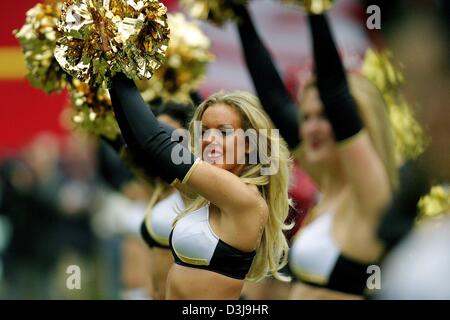 (dpa) - The cheerleaders of NFL Europe team Berlin Thunders in action during a game at Olympic Stadium in Berlin, 4 April 2004. Stock Photo