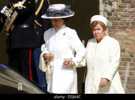 (dpa) - After the funeral service for former Dutch Queen Juliana, Princess Margriet and Princess Christina (R) of the Netherlands leave the Nieuwe Kerk (New Church) in Delft, Netherlands, 30 March 2004. The former queen died on 20 March 2004 at the age of 94 and was buried in the family crypt in Delft. Crowds of people arrived to witness the event. Stock Photo