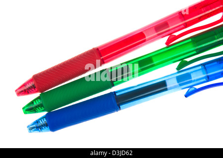 Red, green and blue ballpoint pens on white background Stock Photo