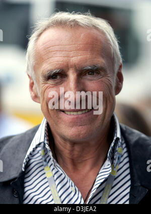 (dpa) - Owner of Red Bull company and Red Bull Racing Team Austrian billionaire Dietrich Mateschitz smiles at the F1 race track in Imola, Italy, 23 April 2005. The Grand Prix of San Marino took place 24 April. Stock Photo