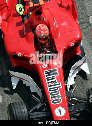 (dpa) - German Formula One driver Michael Schumacher of Ferrari drives his racing car on the Formula One racetrack in Imola, Italy, Friday 22 April 2005. The Grand Prix of San Marino will start here Sunday 24 April 2005. Stock Photo