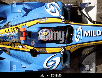 (dpa) - Spanish Formula One driver Fernando Alonso of Renault drives his racing car on the Formula One racetrack in Imola, Italy, Friday 22 April 2005. The Grand Prix of San Marino will start here Sunday 24 April 2005. Stock Photo