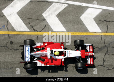 (dpa) - German Formula One driver Ralf Schumacher of Toyota drives his racing car on the Formula One racetrack in Imola, Italy, Friday 22 April 2005. The Grand Prix of San Marino will start here Sunday 24 April 2005. Stock Photo