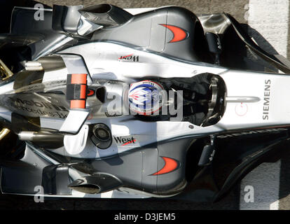 (dpa) - Finnish Formula One driver Kimi Raeikkoenen of McLaren Mercedes drives his racing car at the Formula One racetrack in Imola, Italy, Friday 22 April 2005. The Grand Prix of San Marino will start here Sunday 24 April 2005. Stock Photo