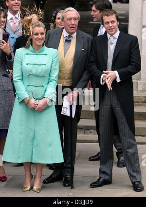 (dpa) - Laura (L) and Tom Parker Bowles (R) attend with the father of the bride, Bruce Shand (C), the wedding of their mother Camilla Parker Bowles and Prince Charles in Windsor, UK, 09 April 2005. Stock Photo