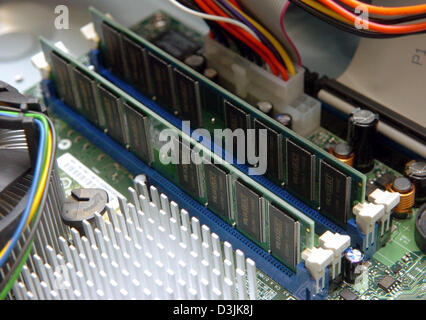 (dpa) - A view of memory slots on the  motherboard of a computer  pictured in Hamburg, Germany, 28 February 2005. Stock Photo