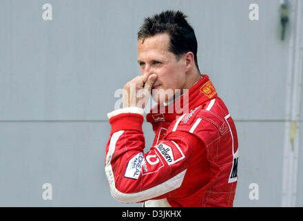 (dpa) - German Formula One driver Michael Schumacher pictured after the Grand Prix of Malaysia in Sepang, near Kuala Lumpur, Malaysia, 20 March 2005. Schumacher finished 7th. Stock Photo