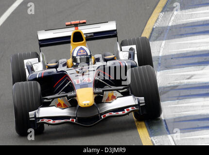 (dpa) - British Formula One driver David Coulthard drives his Red Bull racing car during practice session around the Grand Prix circuit in Albert Park, Melbourne, Australia, 04 March 2005. Stock Photo