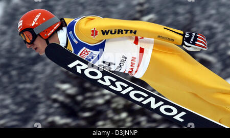 (dpa) - German ski jumper Michael Uhrmann flies through the air during the qualifying jump at the Nordic Skiing World Championship in Oberstdorf, Germany, 18 February 2005. He is one of four Germans to qualify for the final run. Stock Photo