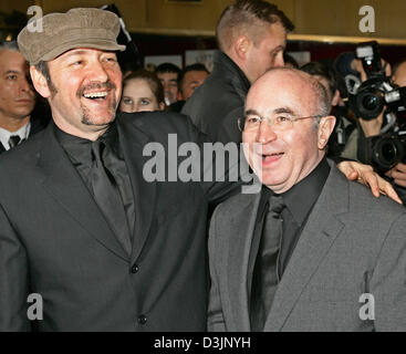 (dpa) - British actor Bob Hoskins (R) and US actor Kevin Spacey, who also directs, arrive for the presentation of the film 'Beyond the sea' (USA) during the 55th Berlinale international film festival in Berlin, Germany, 13 February 2005. A total of 21 films compete for the Golden and Silver Bear prizes at the Berlinale. Stock Photo