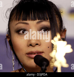 (dpa) - Chinese actress Bai Ling speaks into the microphone during a press conference in Berlin on Thursday 10 February 2005. The members of international jury of this year's Berlinale filmfestival were introduced to the press today. Stock Photo