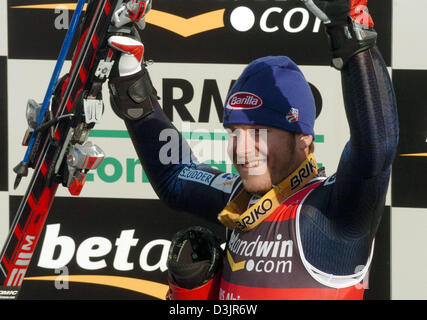 (dpa) - US skier Bode Miller smiles and celebrates after winning the gold medal in the Men's Super G at the Alpine Skiing World Championships in Bormio, Italy, 29 January 2005. Stock Photo