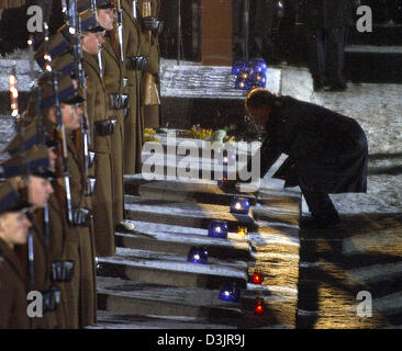 (dpa) - German President Horst Koehler lights a candle on the memorial stones for Holocaust victims at the former concentration camp in Auschwitz, Poland, 27 January 2005. Later Koehler took part in a commemoration for the 60-year-anniversary of the camp's liberation. Stock Photo