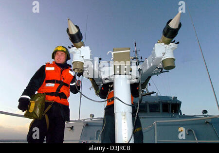 (dpa) - Navy sailors of the Norwegian minesweeper 'HNoMS Alta' practice the use with an anitaircraft gun of the type 'Mistral' on the Baltic Sea near Neustadt, Germany on Wednesday 26 January 2005. Six vessels of the Standing Nato Response Force Mine Counter Measure Group 1 from five nato member states participate in fire fighting, antiaircraft, leakage and mine sweeping exercises  Stock Photo