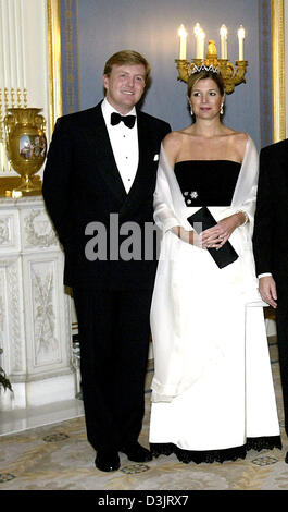 (dpa) - Crown Prince Willem-Alexander and Crown Princess Maxima of the Netherlands smile during the reception for Latvian President Vaira Vike-Freiberga in The Hague, the Netherlands, 18 January 2005. Stock Photo