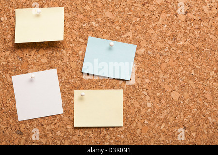 Corkboard with Note papers Stock Photo