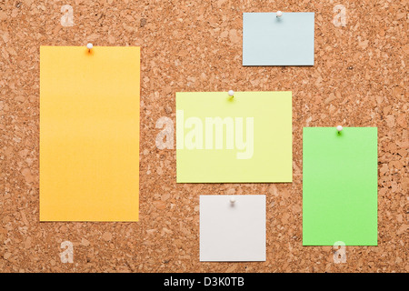Corkboard with Note papers Stock Photo