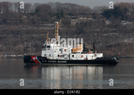 US Coast Guard Cutter Penobscot Bay, a small icebreaker, sits at anchor on the Hudson River, ready for icebreaking duty. Stock Photo