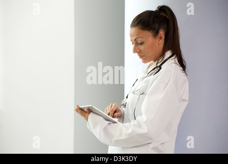 female doctor using ipad tablet computer Stock Photo