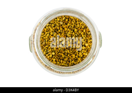 pollen in a glass pot isolated on white background Stock Photo