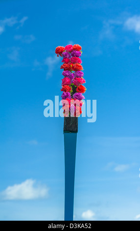 View from the bow of Maldivian wooden dhoni boat on tropical island and turquoise ocean Stock Photo