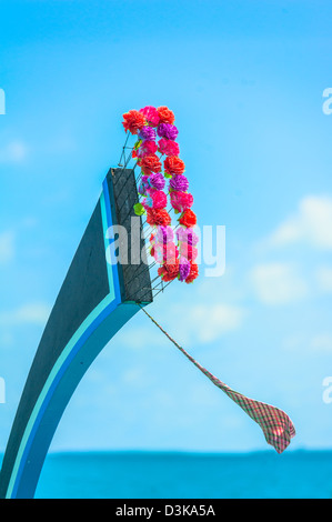 View from the bow of Maldivian wooden dhoni boat on tropical island and turquoise ocean Stock Photo