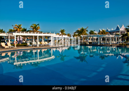 Swimming pool with bright reflections at Hotel Riu Montego Bay all-inclusive resort, no people Stock Photo