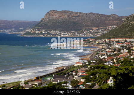 False Bay, near Cape Town in the Cape Peninsula, South Africa, with Kalk Bay Harbour in the foreground and Fish Hoek in the back Stock Photo