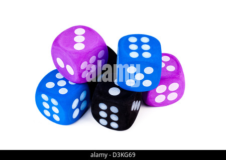 Stack of 6 dice in blue, purple, and black on white background. Stock Photo