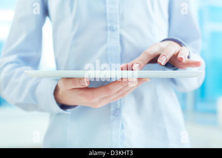 Hands of white collar worker using touchpad Stock Photo