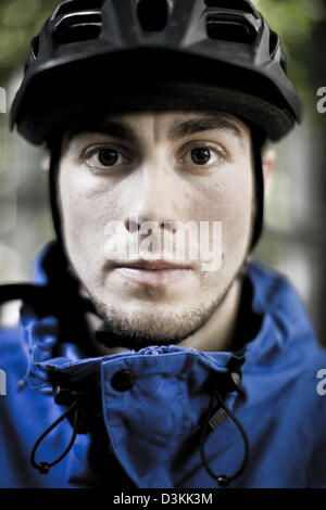 Portrait of mountain biker, Esher forest, England Stock Photo