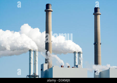 Smoke emission from factory pipes Stock Photo