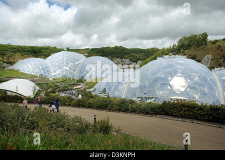 (dpa) - The picture dated 28 May 2005 shows the vast greenhouses of the 'Eden Project' in Boldeva near St Austell, Cornwall, UK. The 'Eden Project' located in a former quarry was established in September 2000. In the greenhouses grow plants from different climate zones, the so-called Biomes. The biggest conservatory is 240 metres long and 110 metres high. Photo: Franz-Peter Tschaun Stock Photo