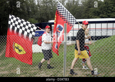 (dpa) - Ferrari fans walk along the track during the first training session at  the Italian Grand Prix track in Monza, Italy, Friday 02 September 2005. The Grand Prix of Italy takes place in Monza on Sunday 04 September. Foto: Gero Breloer Stock Photo
