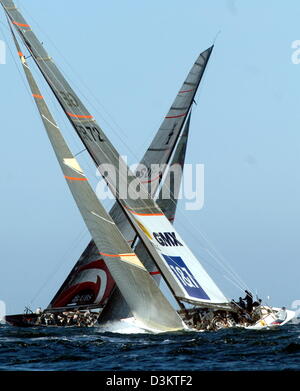 The German sailing yacht 'GER 72'  of United Internet Team Germany races against the Suiss yacht Alinghi during the 'Act 7' fleetrace of the preliminary regattas in the run-up to the America's Cup yacht race off the coast of Malmoe, Sweden, Saturdy, 03 September 2005. Jasper Bank, the Danish skipper of Team Germany and his crew managed to cross the finishing line on seventh place.  Stock Photo