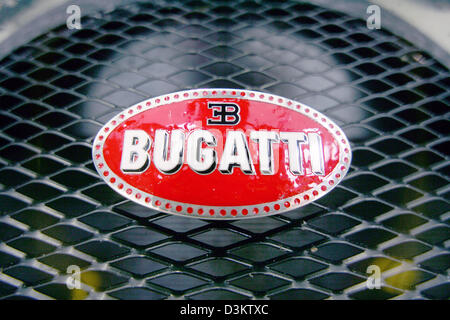 (dpa) - The logo of car manufacturer Bugatti pictured on the hood of the new model EB Veyron 16.4 in the factory in Molsheim, France, Thursday 8 September 2005. After several delays the Volkswagen daughter Bugatti Automobiles SAS releases the most expensive and fastest car permitted for the road traffic. In the following year a maximum of 300 exemplars of 1001 HP strong and 407 km/ Stock Photo