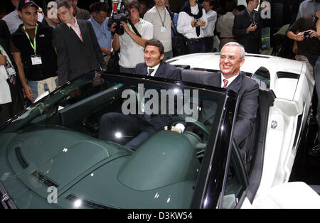 (dpa) - The picture shows Audi AG chairman Martin Winterkorn (R) and Lamborghini president Stephan Winkelmann sitting in the new Lamborghini 'Gallardo Roadster' at the 61st International Motor Show (IAA) in Frankfurt Main, Germany, Monday 12 September 2005. The IAA is the world most comprehensive automobile show of the whole industry with almost 1.000 exhibitors from 44 countries.  Stock Photo