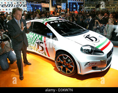 (dpa) - FIAT's president Luca di Montezemolo (L) presents the new Fiat Punto Abarth the International Motor Show (IAA) in Frankfurt Main, Germany, Tuesday, 13 September 2005. The 61st IAA continues until 25 September and organisers expect around one million visitors. Almost 1,000 exhibitors from 44 countries present their latest products from the world of automobiles. Photo:Uli Dec Stock Photo
