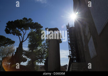 Statue on a pillar of the she-wolf suckling Romulus and Remus on the Capitoline Hill in Rome Stock Photo