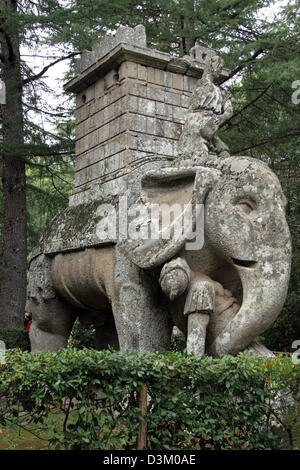 (dpa) - The picture dated 02 October 2005 shows an elephant sculpture at the Sacred Grove (Bosco Sacro) in Bomarzo, Italy. In the 16th century, Vicino Orsini, Duke of Bomarzo, created the 'Parco dei Mostri', a garden named for its many larger-than-life, bizarre statues. Photo: Lars Halbauer Stock Photo